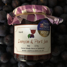 Load image into Gallery viewer, Damson and Port Jam. Our ‘Taste of the West’ 2020 Gold Award Winning Jam. A deep rich, fragrant jam made from Somerset grown Damson Plums combined with vintage ruby barrel aged Port makes this an extra special jam. Serving Suggestion: A rich fruity jam, enjoy simply spread on toast or why not try me as a glaze for duck! Made by Hand at Cedrics in Somerset, England in tiny batches.