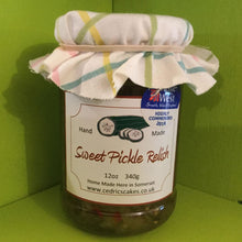 Load image into Gallery viewer, Sweet Pickle Relish. Our ‘Taste of the West’ 2016 Award Winning Relish.     A wonderful Relish made from Crisp Cucumbers, Sweet Peppers and Onions. Our Best one yet according to some!  Serving Suggestion: A particular marvel in Hamburgers and Door-step Ham & Cheese Sandwiches.  Made by Hand at Cedrics in Somerset, England in tiny batches.