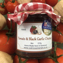 Load image into Gallery viewer, Our ‘Taste of the West’ 2021 Gold Award Winning Chutney.     A wonderful Chutney made with Tomatoes and black garlic   Serving Suggestion: Try in a Ham sandwich, as a dip, and of course along side your favourite cheese.   Made by Hand at Cedrics in Somerset, England in tiny batches.