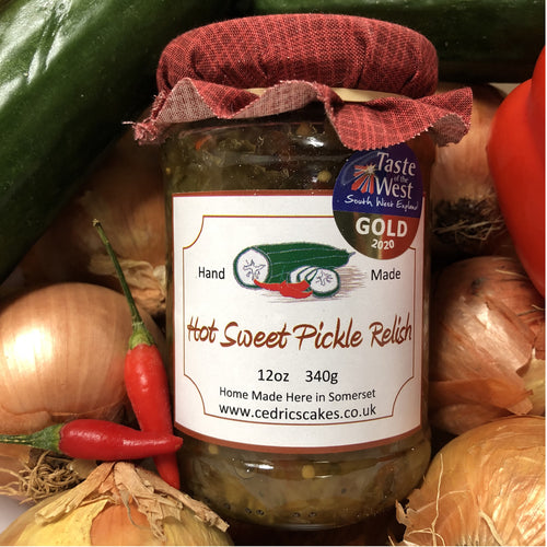 Hot Sweet Pickle. Our ‘Taste of the West’ 2020 Gold Award Winning Relish.     A wonderful Relish made from Crisp Cucumbers, Sweet Peppers, Chilli and Onions. Our Best one yet according to some!  Serving Suggestion: A particular marvel in Hamburgers and Door-step Ham & Cheese Sandwiches.  Made by Hand at Cedrics in Somerset, England in tiny batches. 