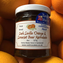 Load image into Gallery viewer, Dark Seville Orange and Somerset Beer Marmalade. Our ‘Taste of the West’ 2015 Award Winning Marmalade.  Organic Seville Oranges and Somerset Beer combines to create a dark and delicious marmalade.  Serving Suggestion: Salutes Breakfast in style - Delicious on hot buttered toast  Made by Hand at Cedrics in Somerset, England in tiny batches. 
