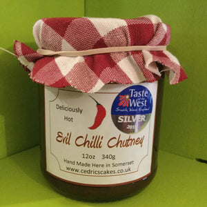 Evil Chilli Chutney. Our ‘Taste of the West’ 2016 Silver Award Winning Chutney.  A great chutney with a kick.  Serving Suggestion: Try pairing with a Traditional Somerset cheddar and enjoy the delicious heat.  Made by Hand at Cedrics in Somerset, England in tiny batches. 