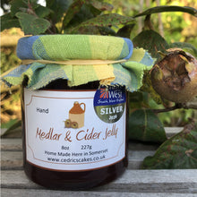 Load image into Gallery viewer, Medlar and Cider Jelly, Our ‘Taste of the West’ 2020 Silver Award Winning Jelly.  A lovely fruity Jelly made with Medlars and Somerset Cider,  Serving Suggestion: Try me on Roast Pork, or with a Cheese board!    Made by Hand at Cedrics in Somerset, England in tiny batches. 
