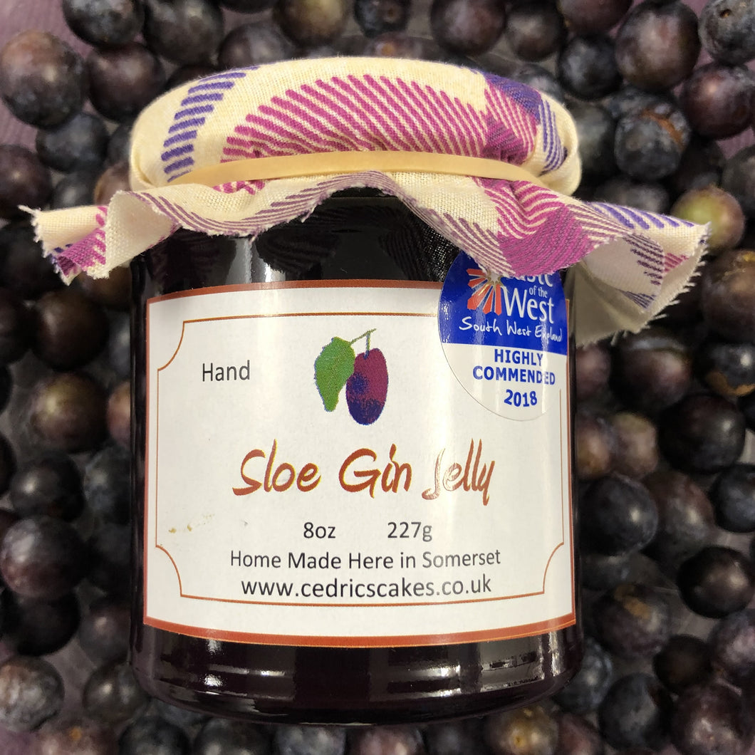 Sloe Gin Jelly. Our ‘Taste of the West’ 2018 Highly Commended Award Winning Jelly.   A decedent, tipsy Jelly.  Serving Suggestion: Perfect partner to traditional cold meats and terrines.  Made by Hand at Cedrics in Somerset, England in tiny batches. 